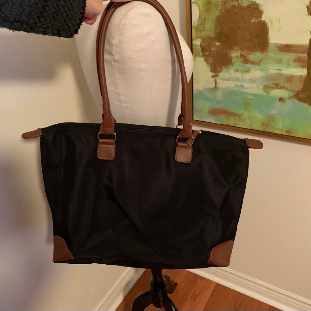 Black bag with faux leather straps